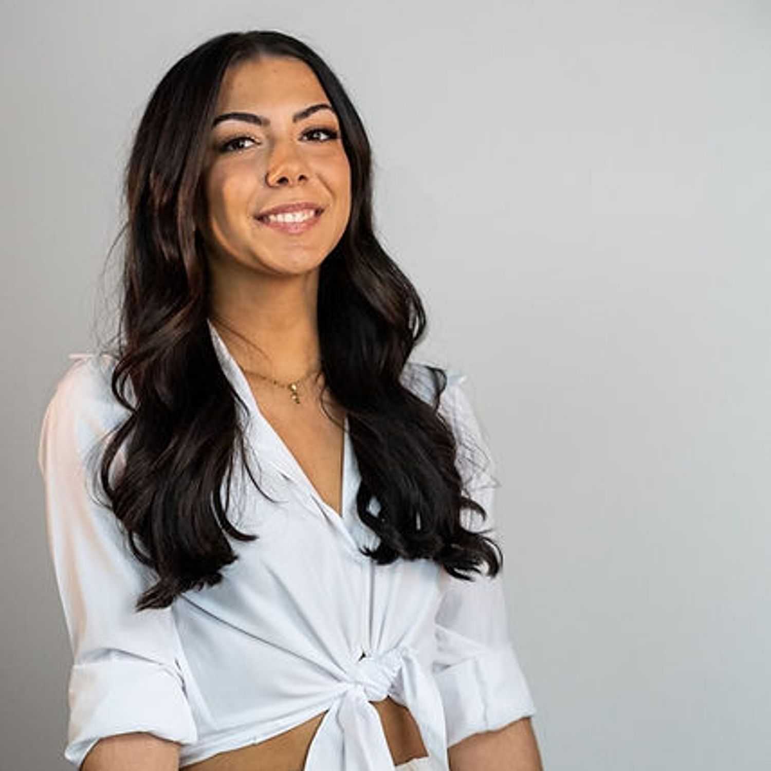 Portrait of Haley, a professional stylist at Salon 685, showcasing their expertise and style.