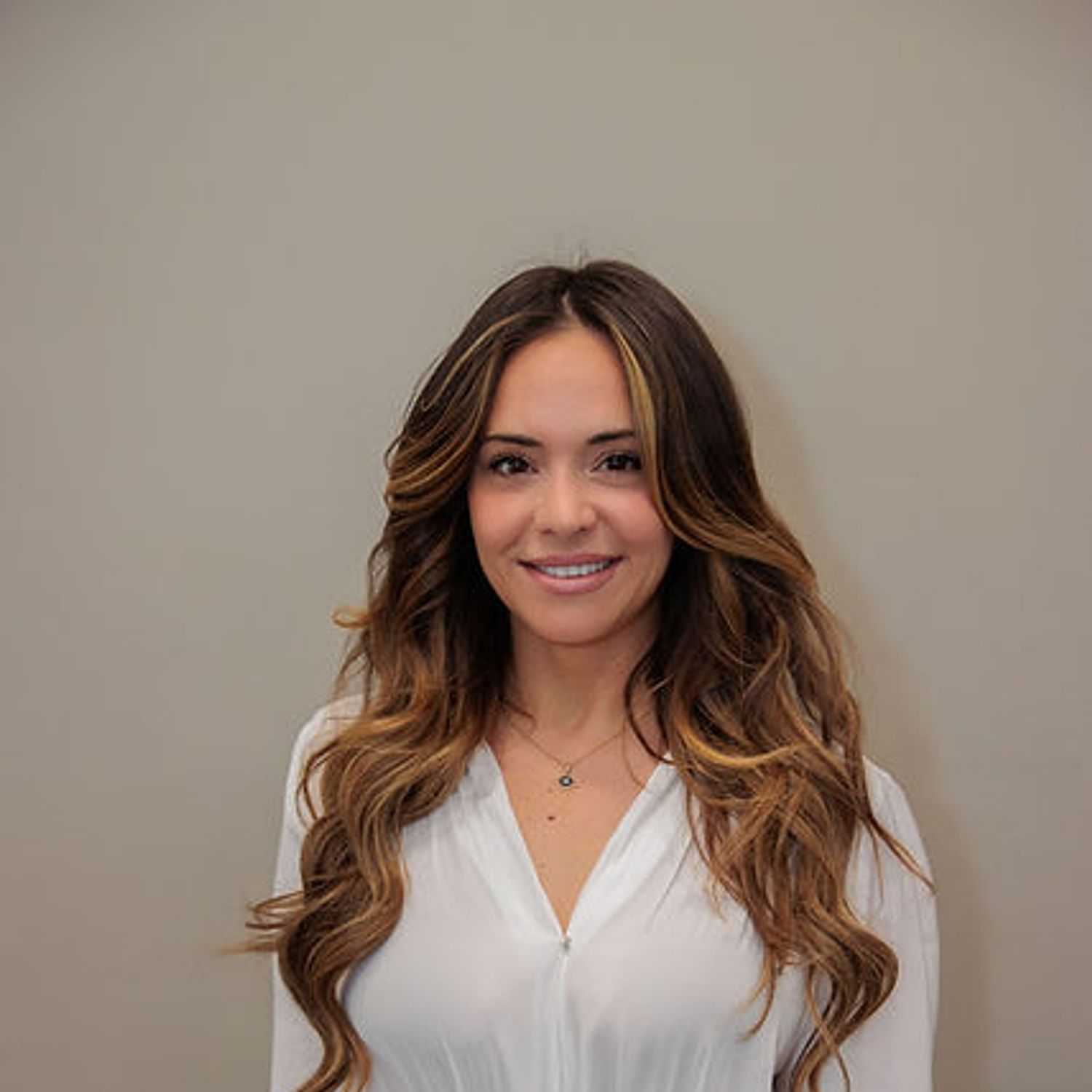 Portrait of Alissa, a professional stylist at Salon 685, showcasing their expertise and style.